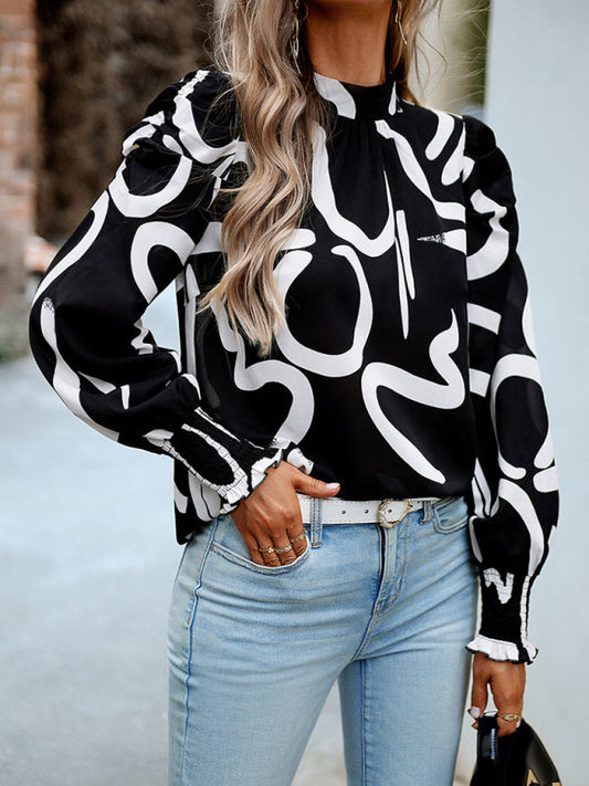 Printed turtleneck puff sleeve blouse